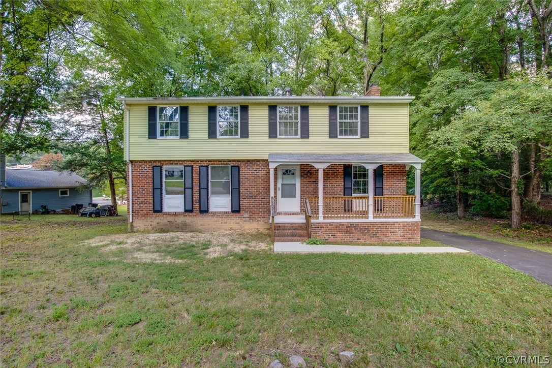 9302 Radborne Road Chesterfield, VA 23236 - Photo 48 of 48 front view of a house with a yard