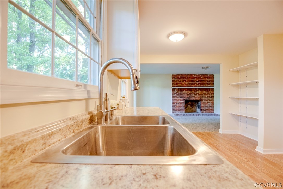 9302 Radborne Road Chesterfield, VA 23236 - Photo 5 of 48 a kitchen with a sink and a large window