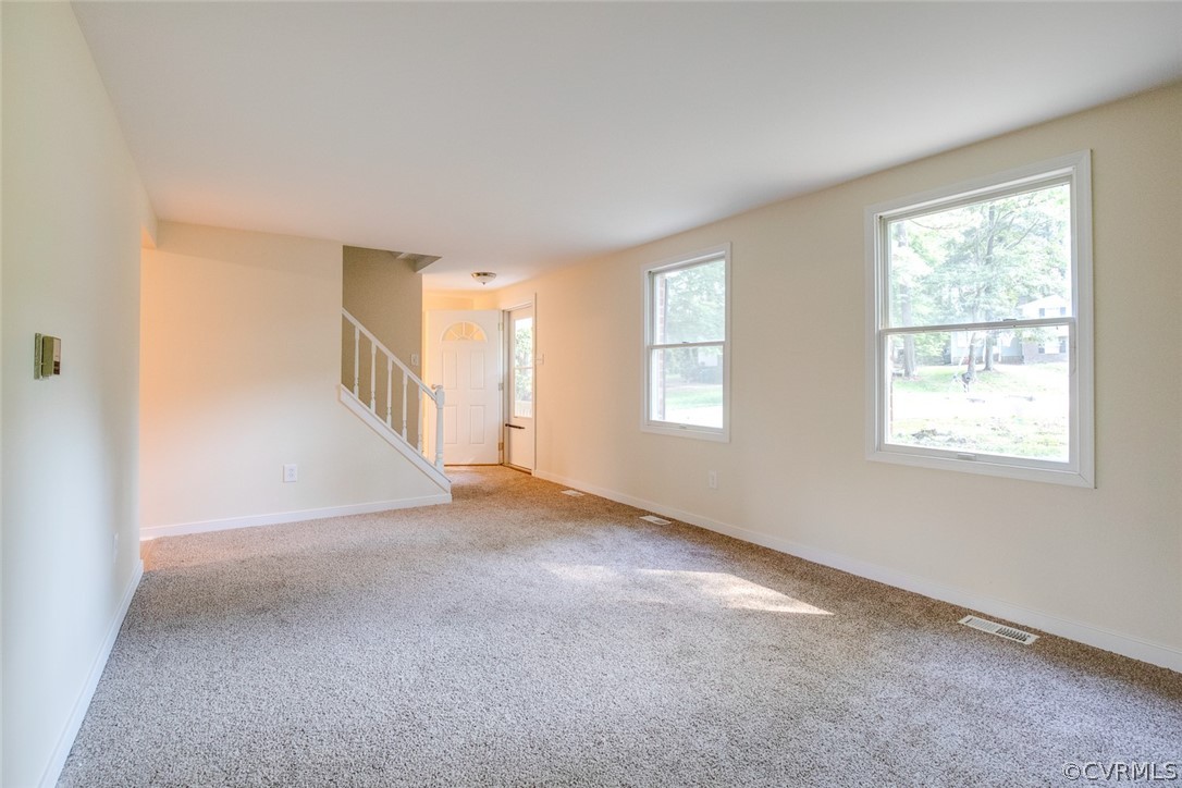 9302 Radborne Road Chesterfield, VA 23236 - Photo 6 of 48 an empty room with windows