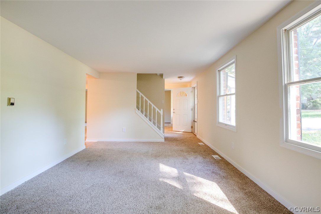 9302 Radborne Road Chesterfield, VA 23236 - Photo 7 of 48 a view of an empty room with a window