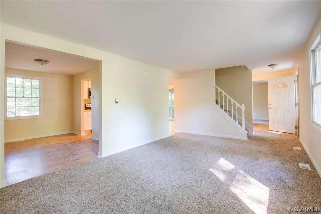 9302 Radborne Road Chesterfield, VA 23236 - Photo 9 of 48 a view of an empty room with a window