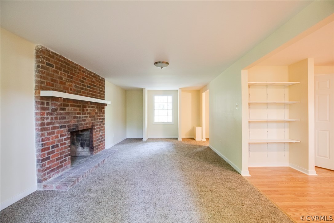 9302 Radborne Road Chesterfield, VA 23236 - Photo 10 of 48 a view of a livingroom with a fireplace