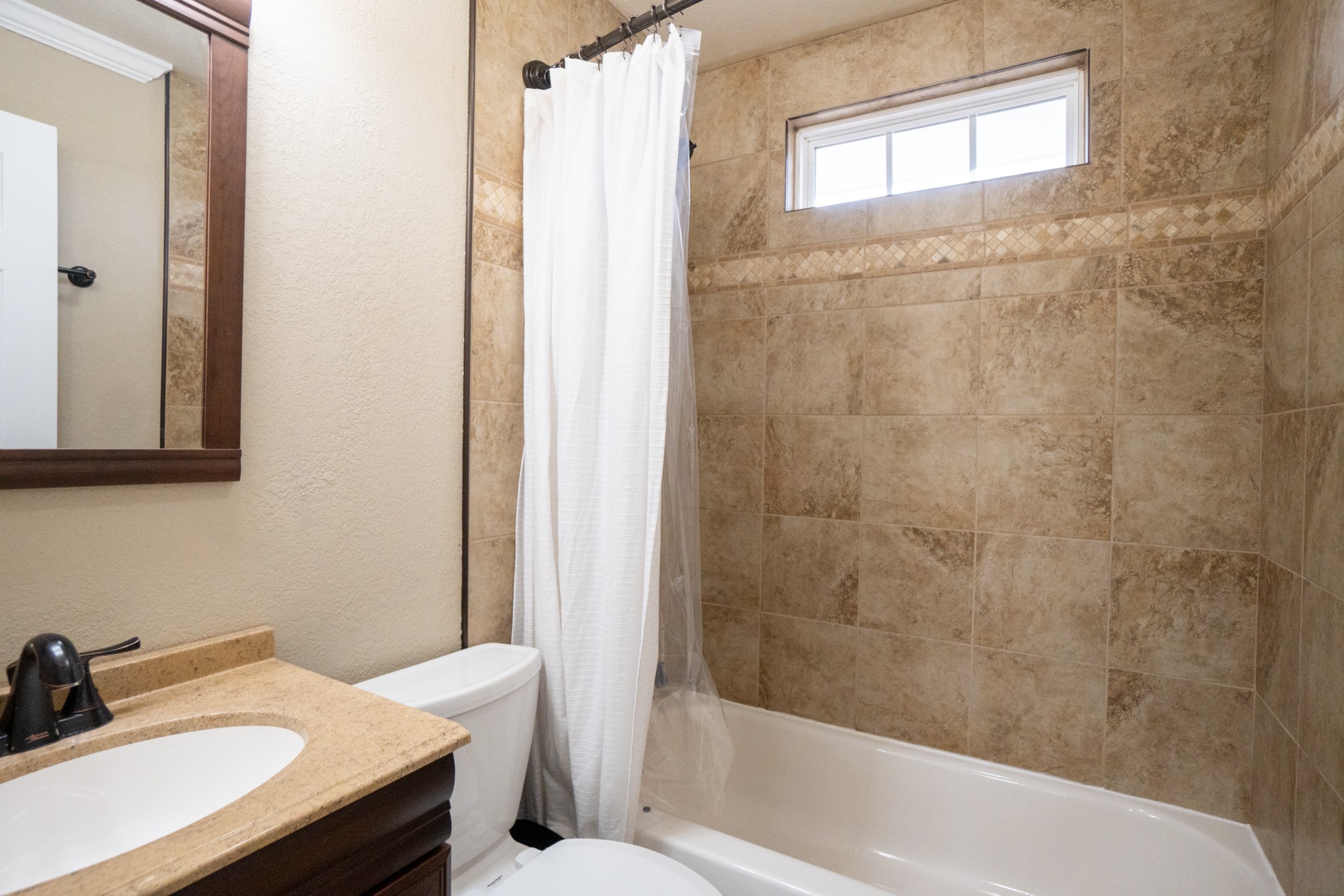 202 Airport Road Portland, TN 37148 - Photo 19 of 38 a bathroom with a sink and a mirror