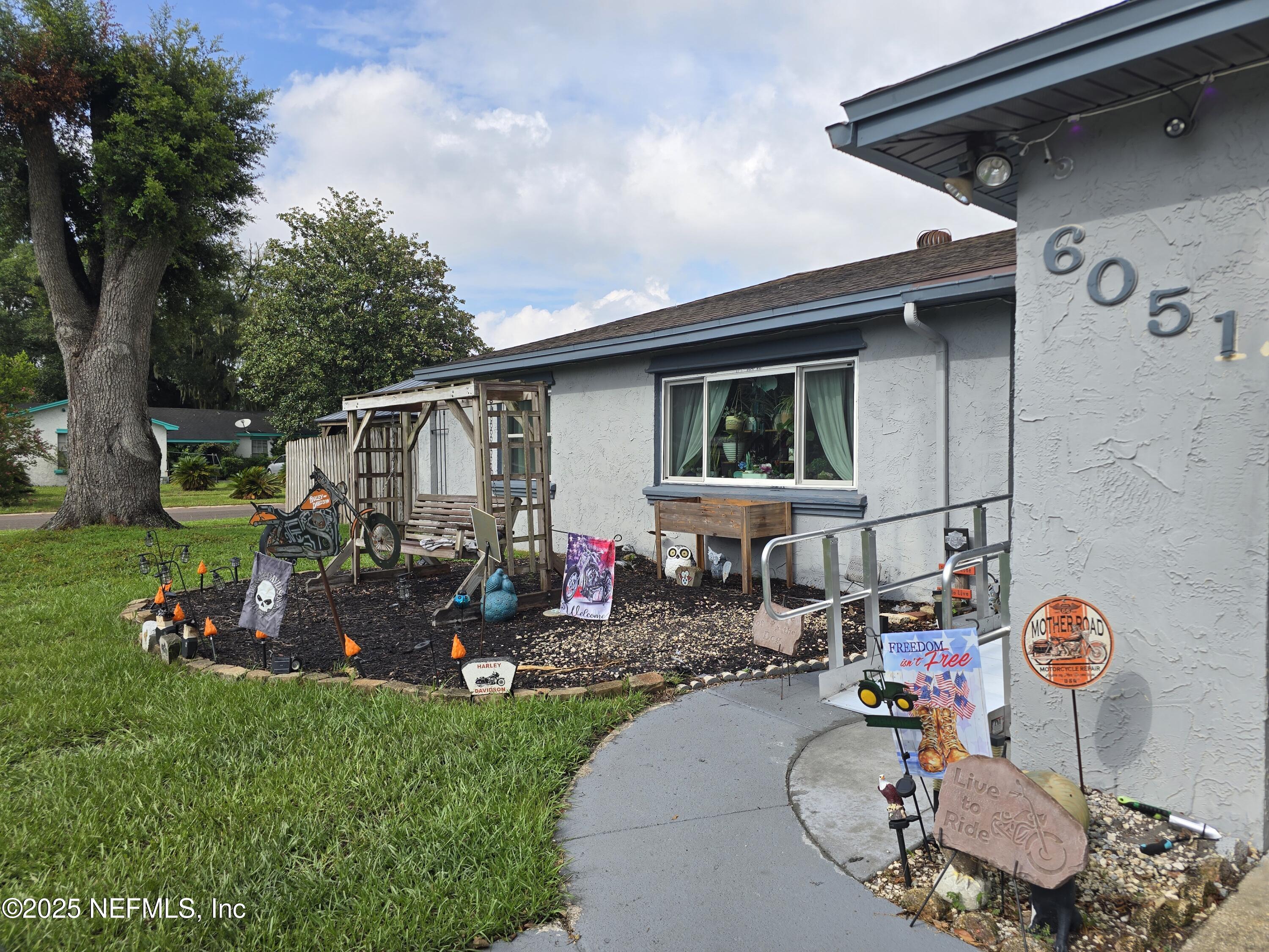 a childrens park with lots of swings and slides