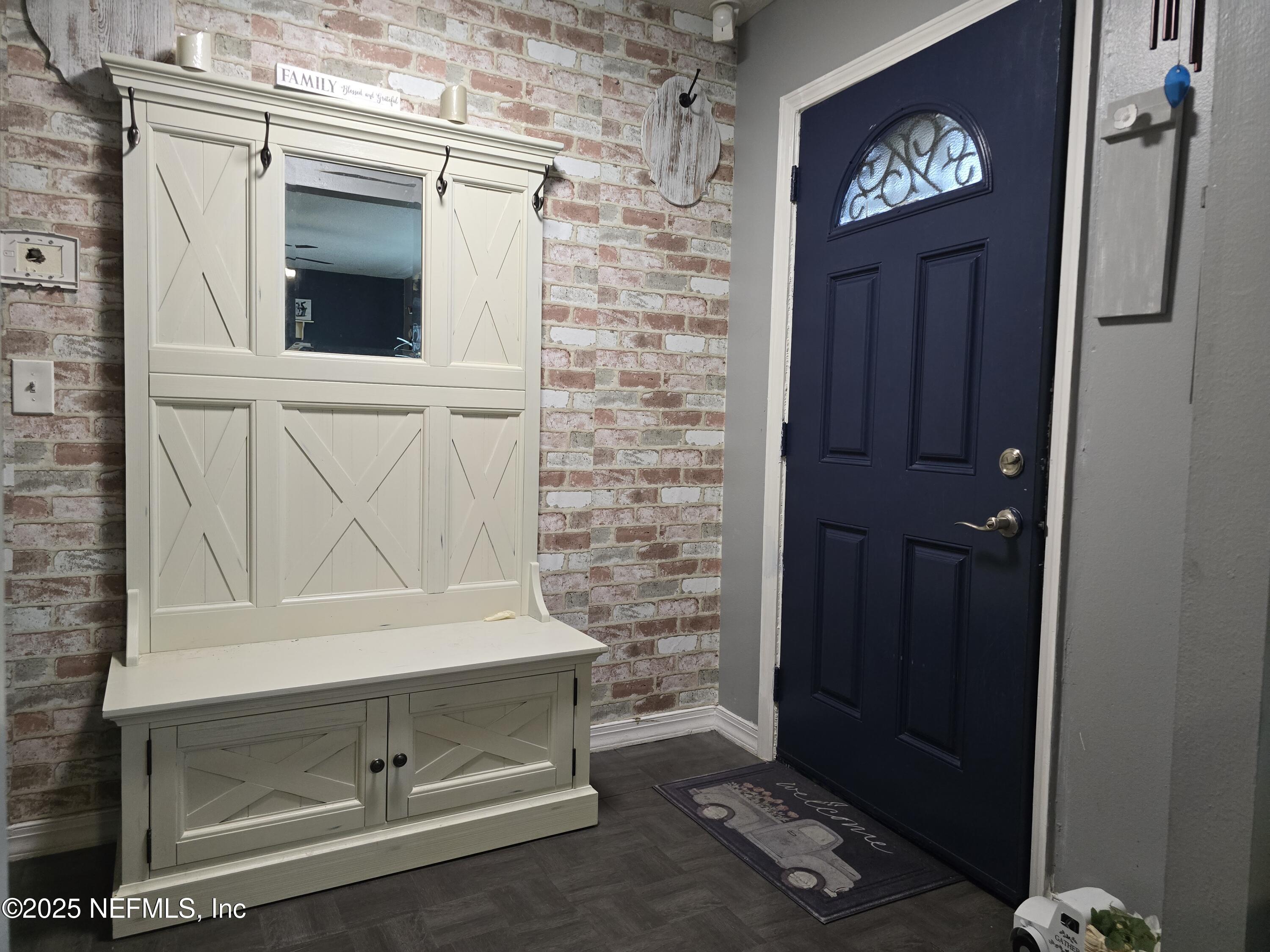 6051 Foxfire Court Jacksonville, FL 32244 - Photo 2 of 31 a view of an entryway door