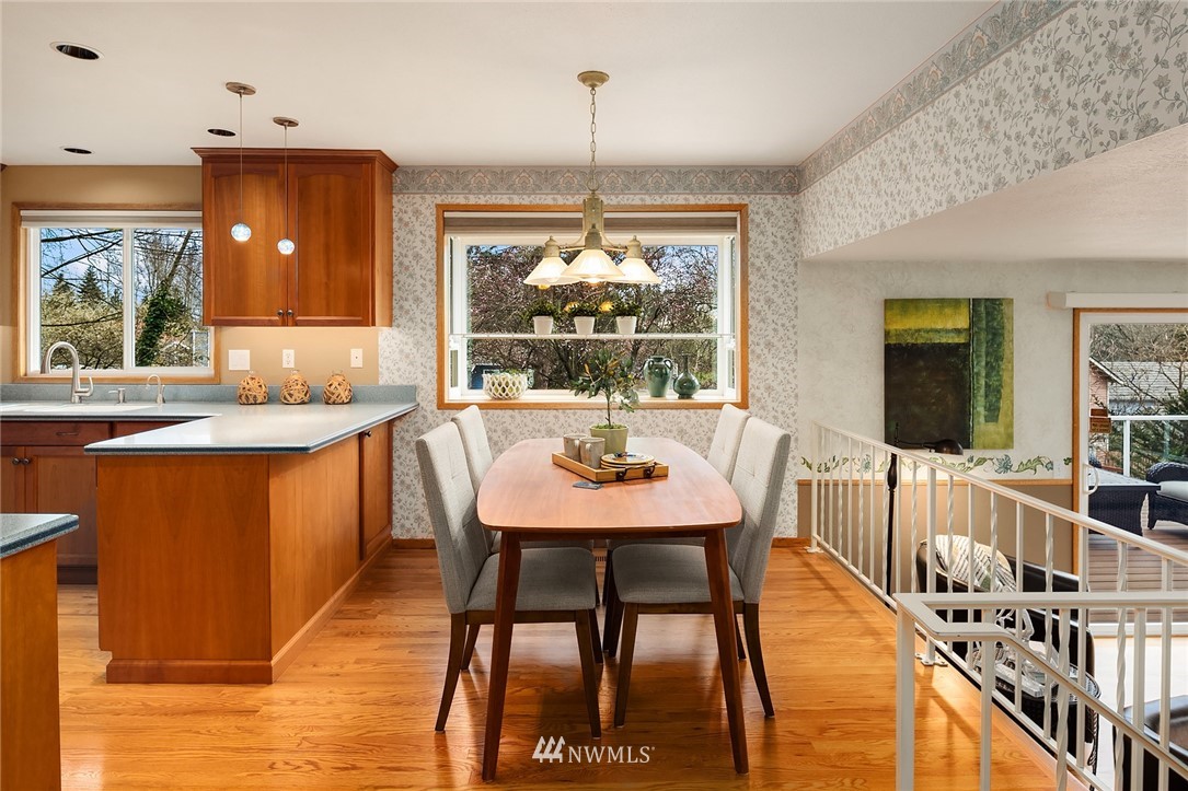 1133 South 23rd Street Renton, WA 98055 - Photo 12 of 38 a view of a dining room with furniture window and outside view