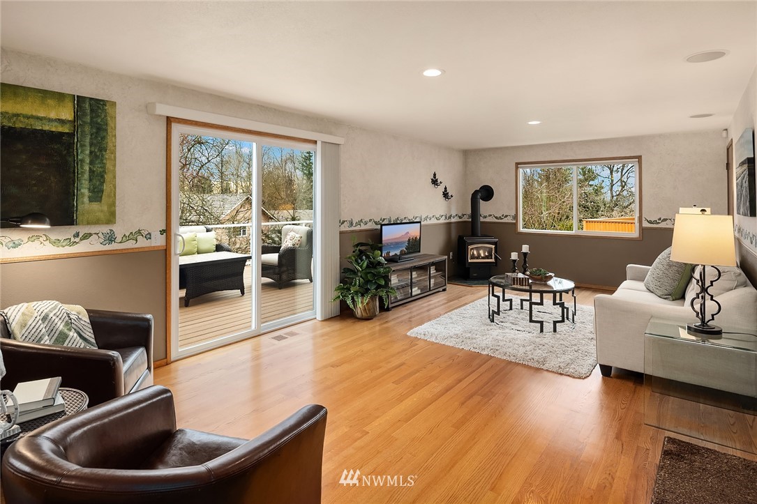 1133 South 23rd Street Renton, WA 98055 - Photo 13 of 38 a living room with furniture and a large window