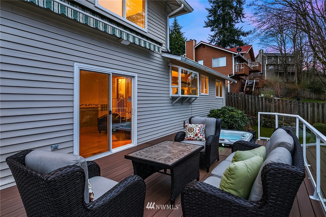 1133 South 23rd Street Renton, WA 98055 - Photo 14 of 38 a view of a patio with couches chairs and a fire pit