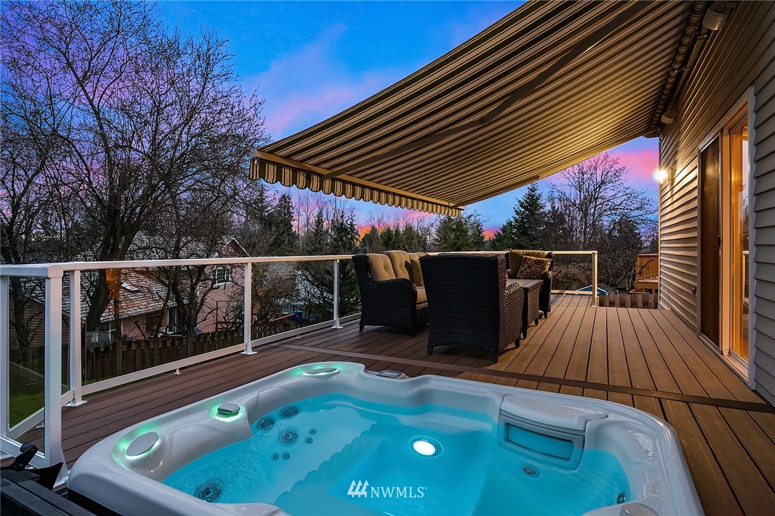 1133 South 23rd Street Renton, WA 98055 - Photo 15 of 38 a view of a roof deck with wooden floor and fence