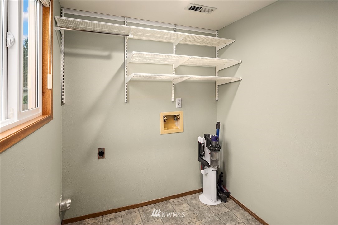 1133 South 23rd Street Renton, WA 98055 - Photo 21 of 38 a view of small space with racks on the wall