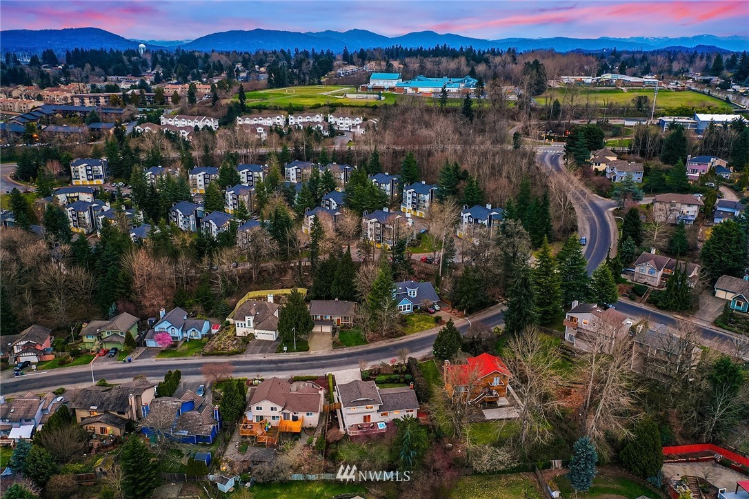 1133 South 23rd Street Renton, WA 98055 - Photo 33 of 38 a area with lots of trees and flowers and fruits