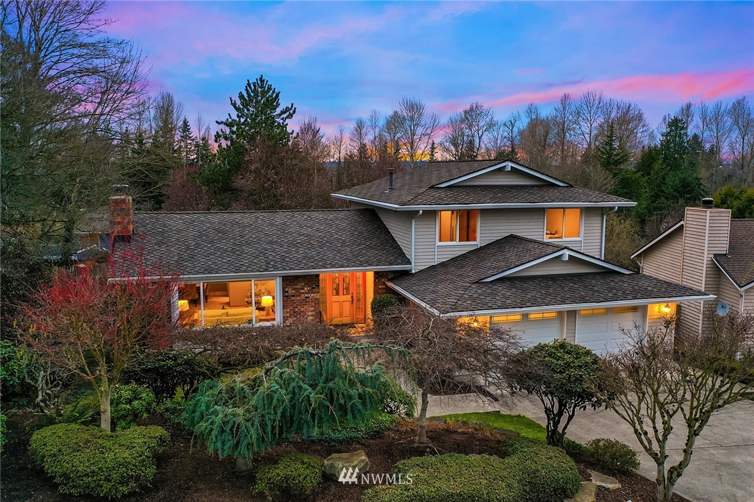 1133 South 23rd Street Renton, WA 98055 - Photo 36 of 38 a view of a house with a yard and potted plants