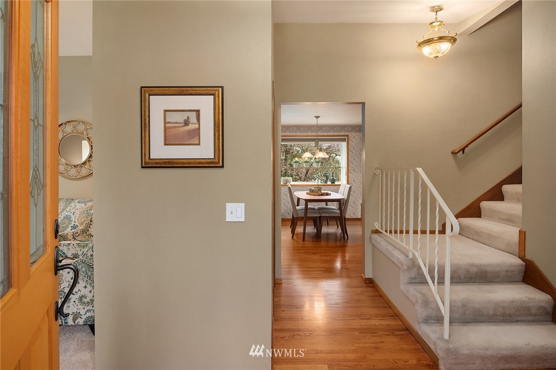 1133 South 23rd Street Renton, WA 98055 - Photo 4 of 38 a view of entryway and hall with wooden floor