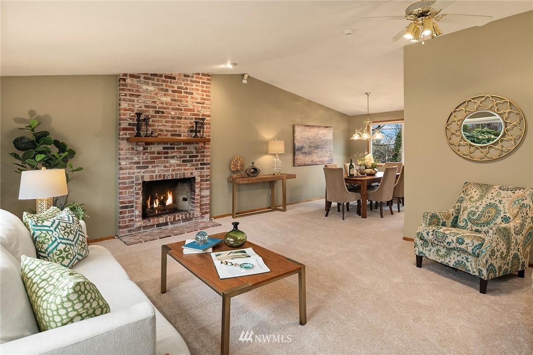 1133 South 23rd Street Renton, WA 98055 - Photo 5 of 38 a living room with furniture and a fireplace
