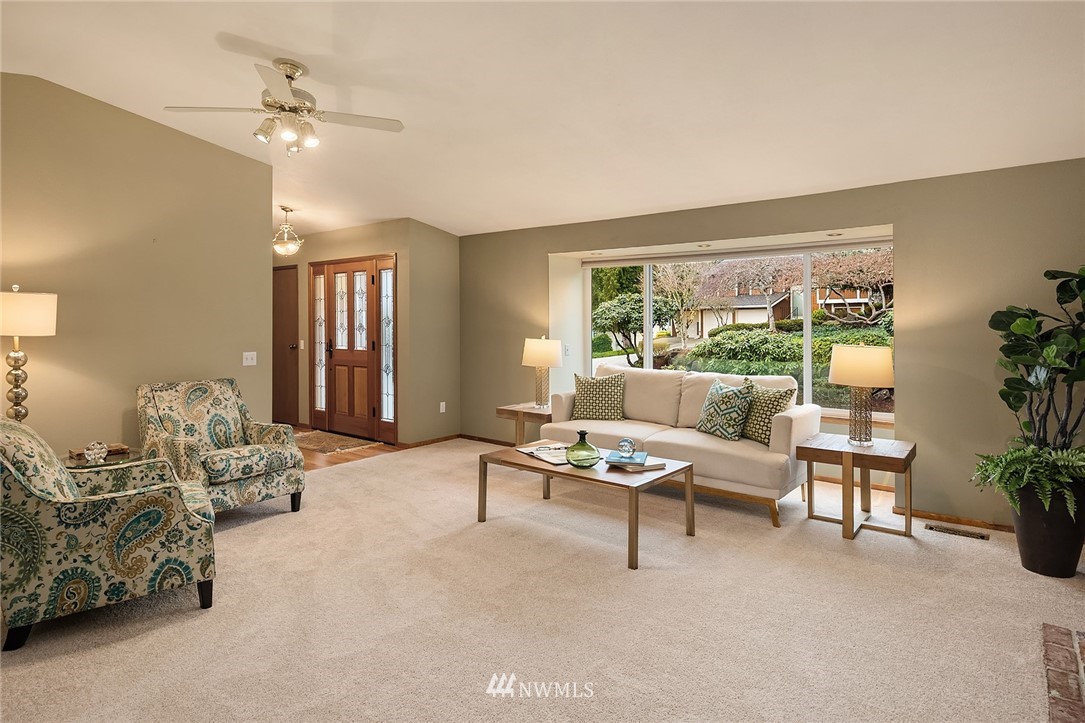 1133 South 23rd Street Renton, WA 98055 - Photo 6 of 38 a living room with furniture and a large window