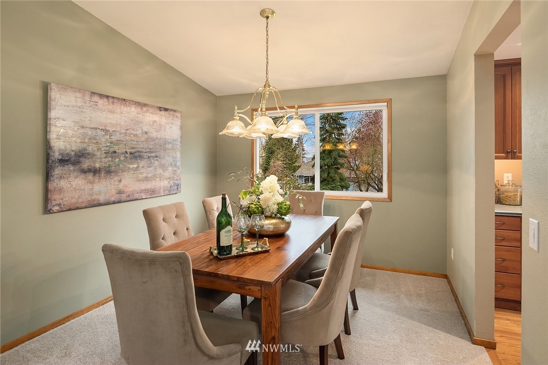 1133 South 23rd Street Renton, WA 98055 - Photo 8 of 38 a dining room with furniture and window