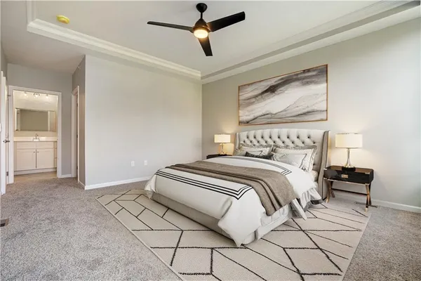a bedroom with a bed and dresser