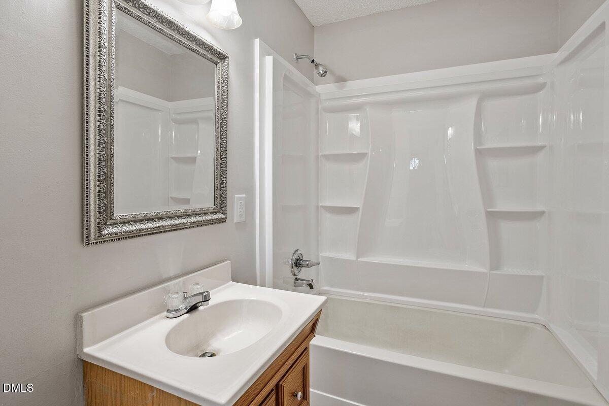 2 Howard Tant Road Zebulon, NC 27597 - Photo 25 of 34 Hallway Full Bath w/New Tub Surround
