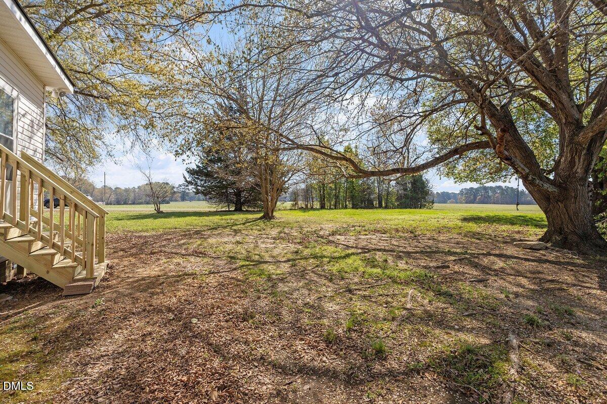 2 Howard Tant Road Zebulon, NC 27597 - Photo 29 of 34 LR Entry/Side Yard Looking toward Street