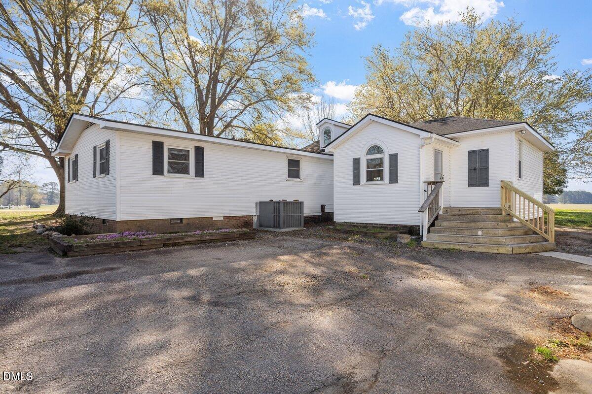 2 Howard Tant Road Zebulon, NC 27597 - Photo 30 of 34 Rear/Rt Side/Driveway Entry Door