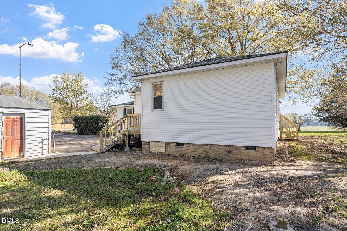2 Howard Tant Road Zebulon, NC 27597 - Photo 32 of 34 Rear Yard View - Garage/Back of Home