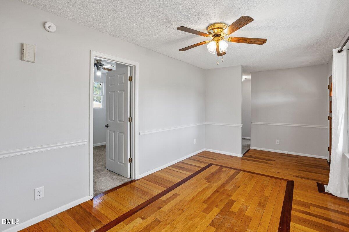 2 Howard Tant Road Zebulon, NC 27597 - Photo 7 of 34 Dining Rm toward Secondary Bedrooms