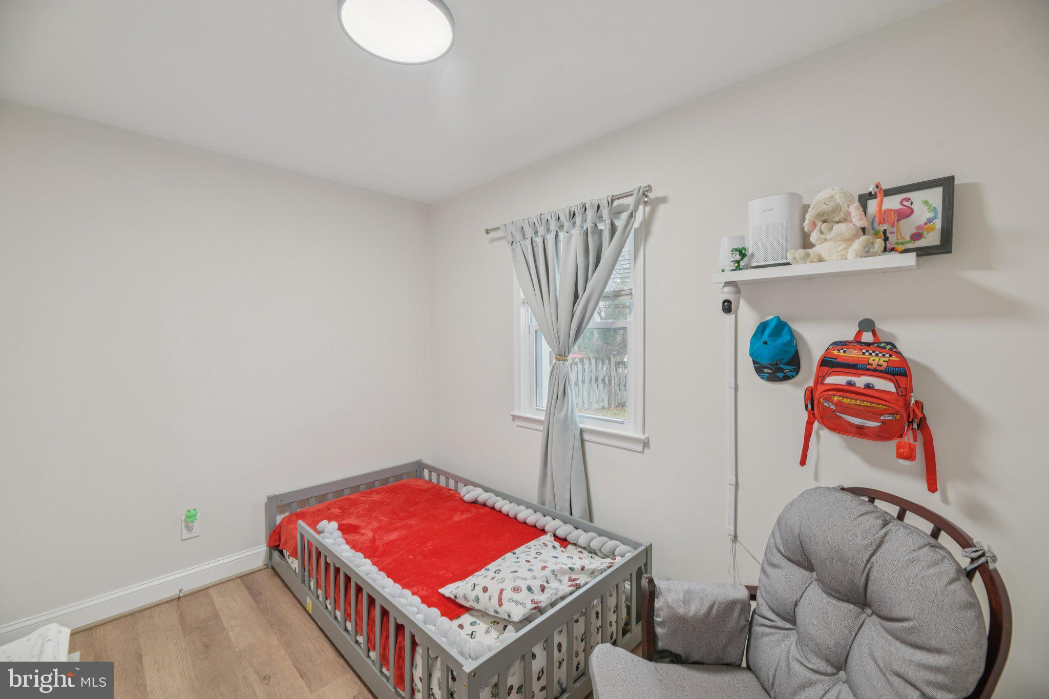 303 Foundry Lane Fort Washington, MD 20744 - Photo 14 of 43 a living room with furniture and a table