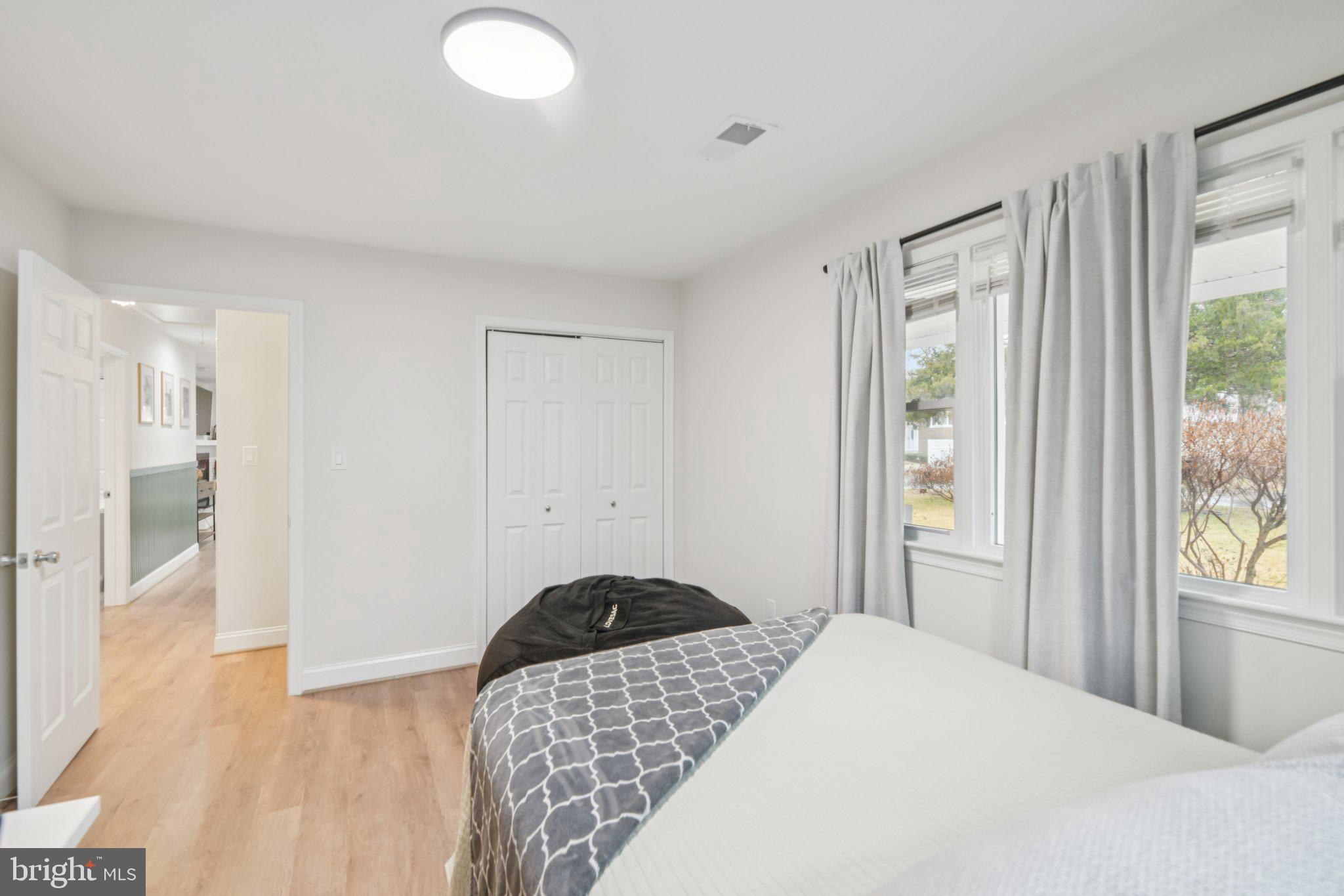 303 Foundry Lane Fort Washington, MD 20744 - Photo 17 of 43 a bedroom with a bed and a window