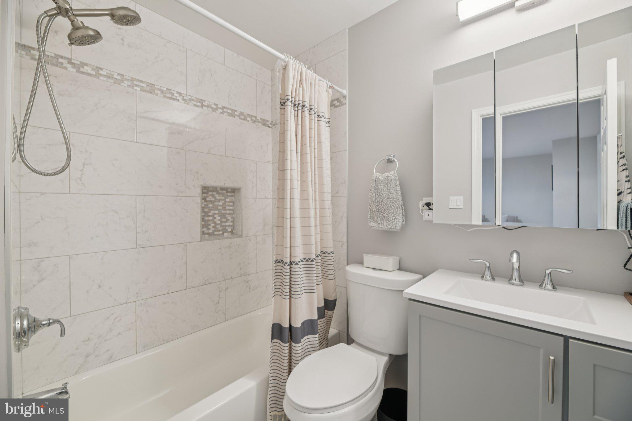 303 Foundry Lane Fort Washington, MD 20744 - Photo 27 of 43 a bathroom with a sink toilet and shower