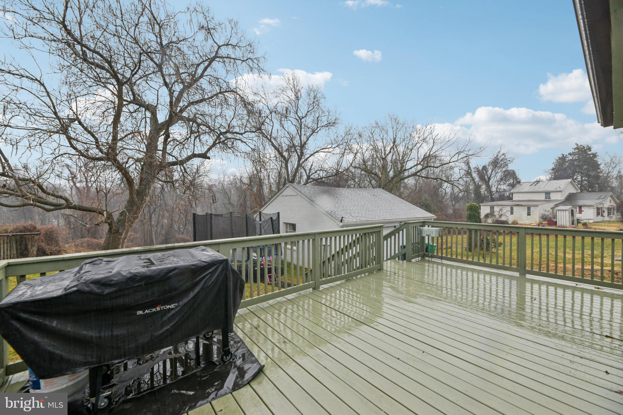 303 Foundry Lane Fort Washington, MD 20744 - Photo 35 of 43 a view of a balcony with wooden floor and seating space