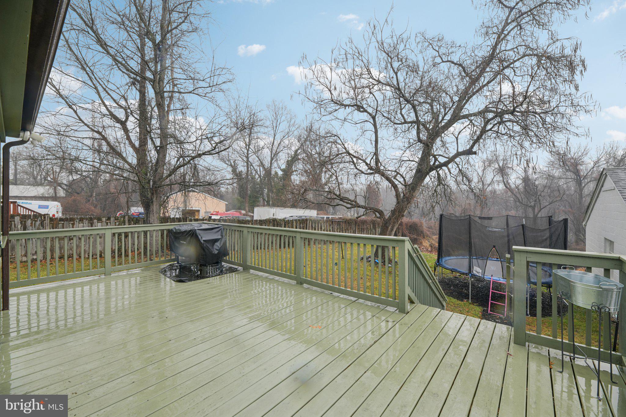 303 Foundry Lane Fort Washington, MD 20744 - Photo 36 of 43 a view of outdoor space with deck and trees