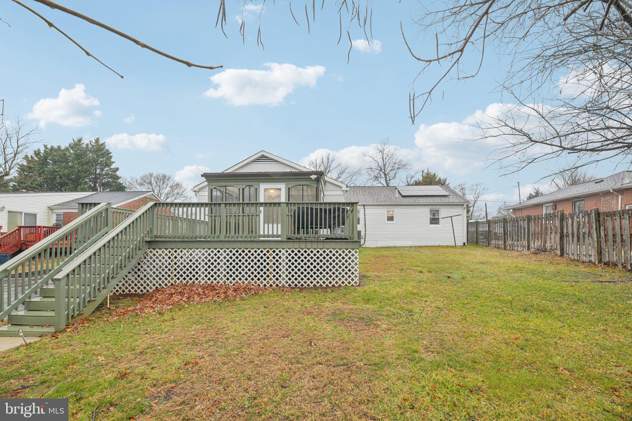 303 Foundry Lane Fort Washington, MD 20744 - Photo 39 of 43 a view of a brick house with wooden fence