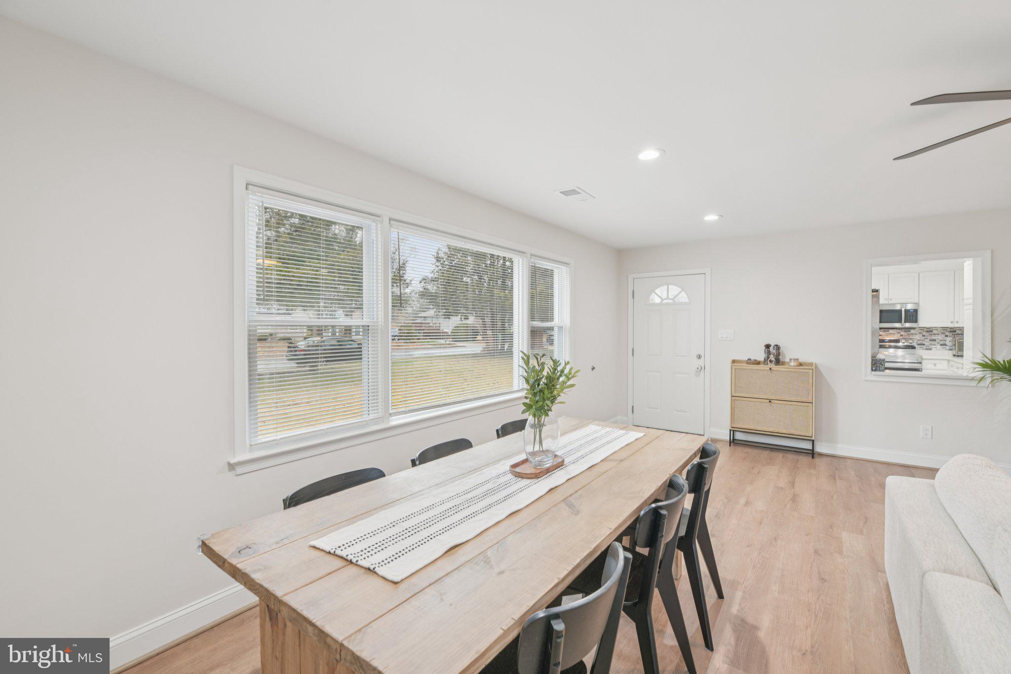 303 Foundry Lane Fort Washington, MD 20744 - Photo 8 of 43 a view of a dining room with furniture and a window