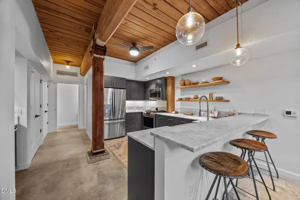 a view of a dining room with furniture