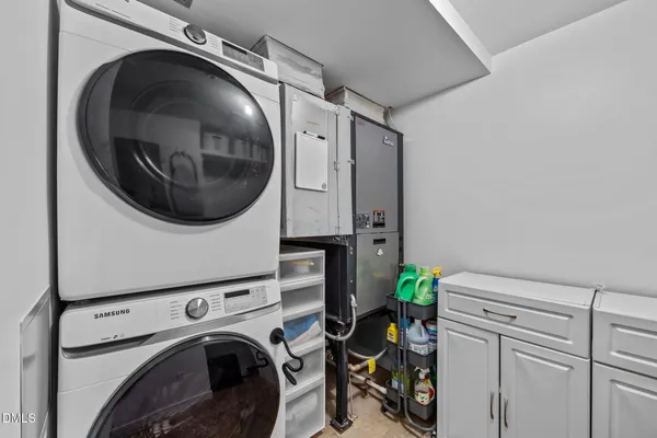 a kitchen with stainless steel appliances wooden cabinets a stove and a refrigerator