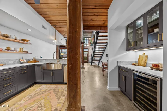a view of a chairs and table in the patio