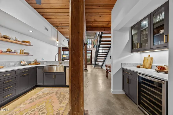 a view of a brick building next to a yard