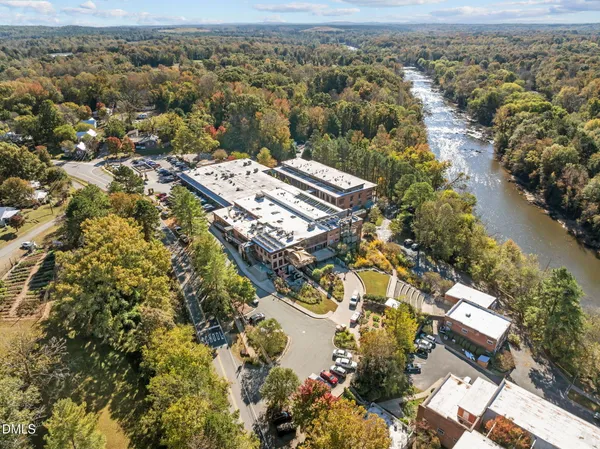 an aerial view of residential house with outdoor space