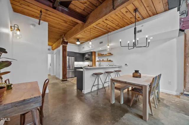 a view of a dining room with furniture