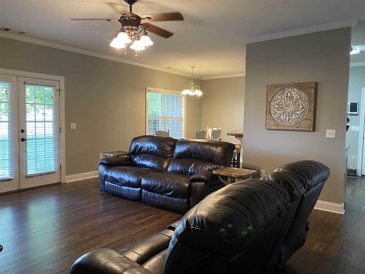 147 Racetrack Drive Cochran, GA 31014 - Photo 6 of 23 a living room with furniture and a chandelier