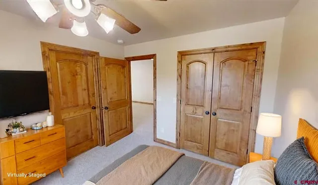 a bedroom with a bed and furniture