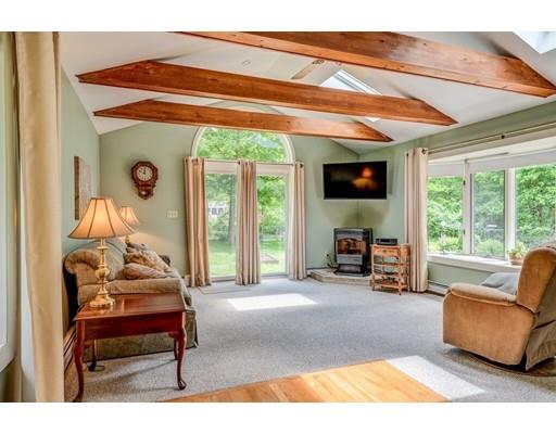 25 Woodside Road Topsfield, MA 01983 - Photo 15 of 37 a bedroom with furniture and a large window