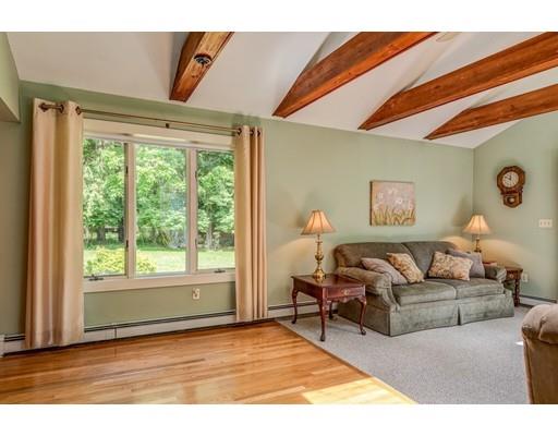 25 Woodside Road Topsfield, MA 01983 - Photo 16 of 37 a living room with furniture and a large window