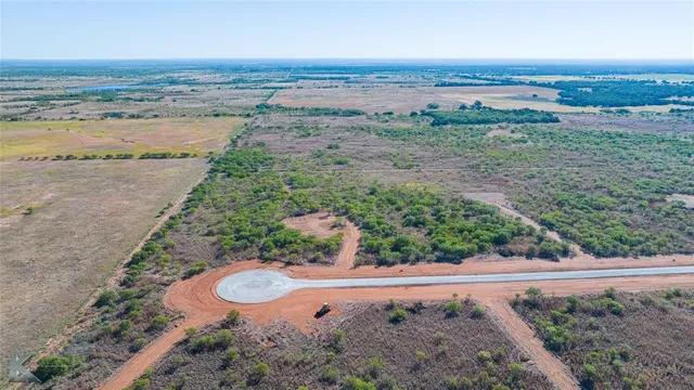 an aerial view of mountain with beach