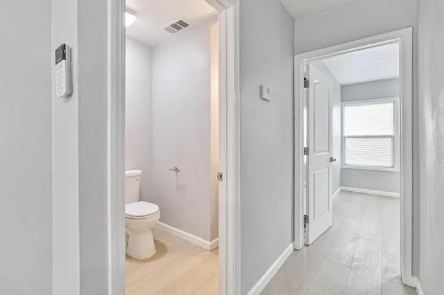a view of bathroom with a toilet sink