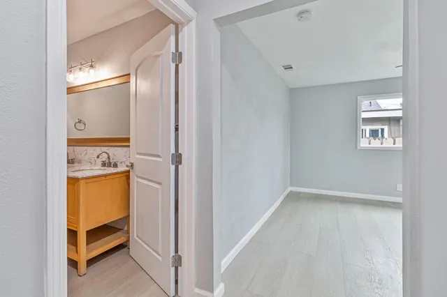 a view of walk in closet with window