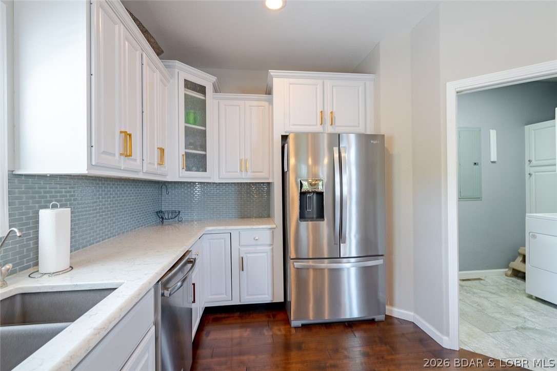 150 Cub Cove Point Camdenton, MO 65020 - Photo 13 of 89 Garage walks thru laundry into kitchen