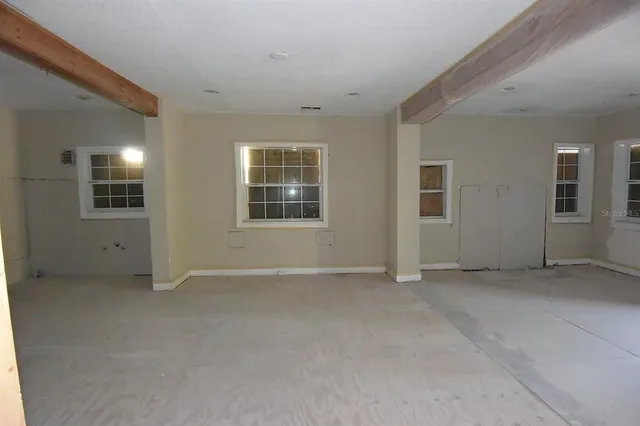 an empty room with windows