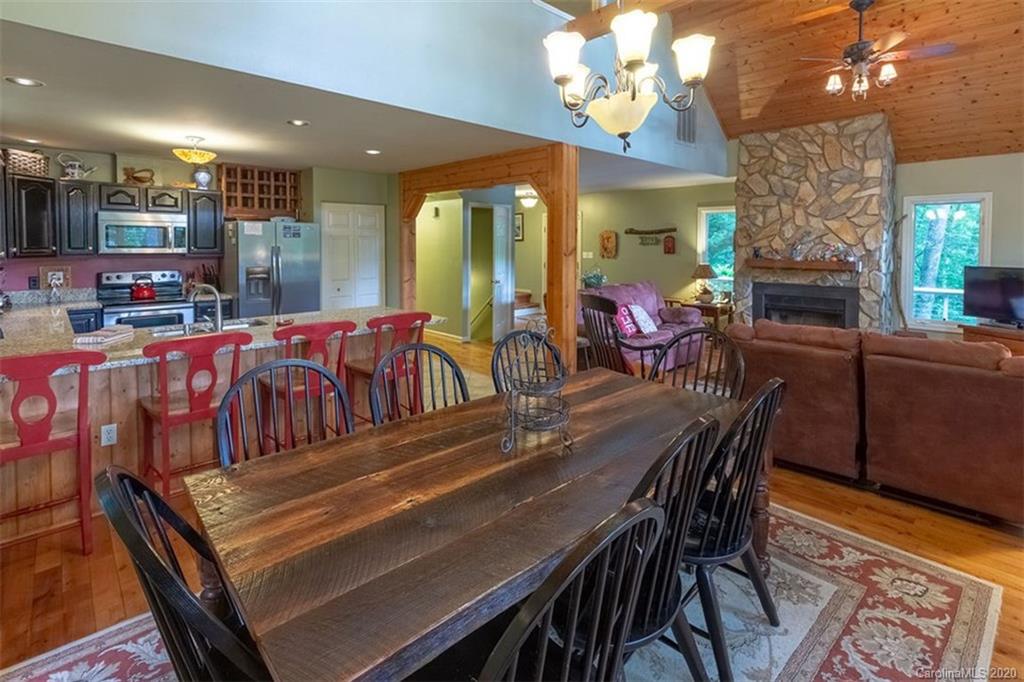 136 Dars Lane Tuckasegee, NC 28783 - Photo 14 of 48 a view of a dining room with furniture