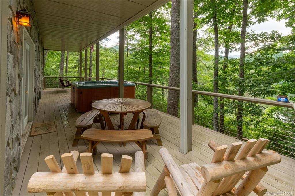 136 Dars Lane Tuckasegee, NC 28783 - Photo 31 of 48 a view of balcony with furniture and outdoor seating